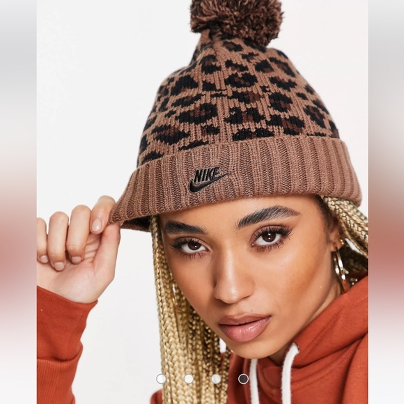 Nike Accessories - Nike leopard print pom pom cuffed, fleece lined hat